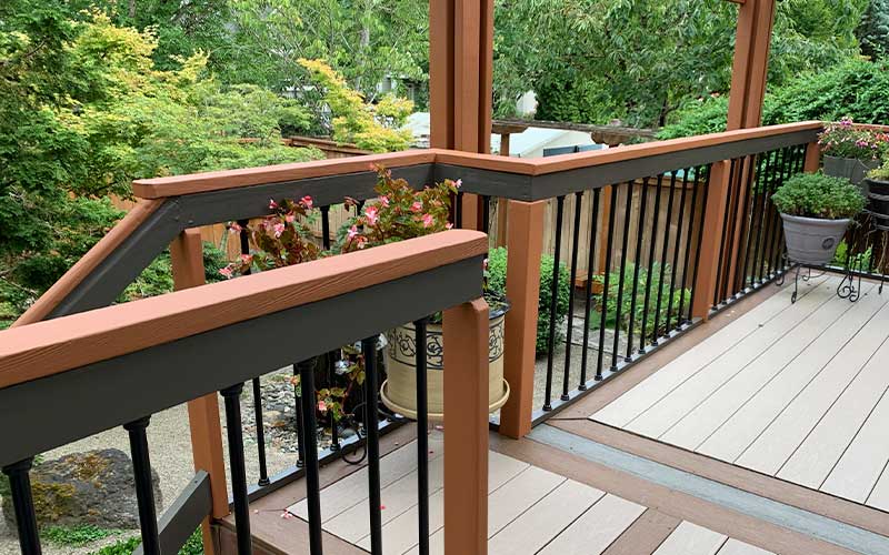 New wood rail with 2x4 cap rail and Snap Lock Balusters