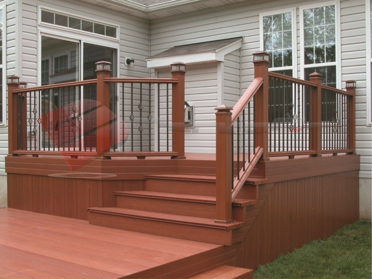Brown Composite Deck with Decorative Black Balusters Check out this beautiful composite deck! Its simple design is accompanied by decorative black balusters to add something special.