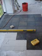 Apply bond coat to deck