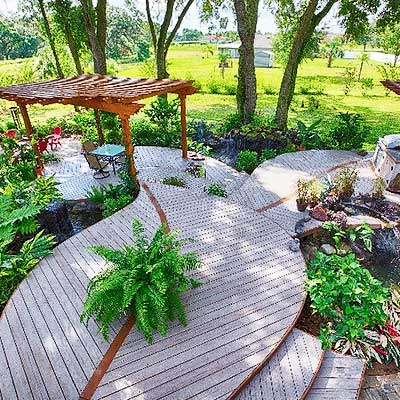 Composite decking can be easily curved to work around trees or gardens