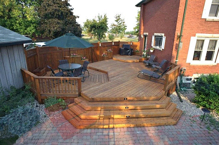 The sunken dining area differentiates between the lounging main level area and the raised BBQ area.