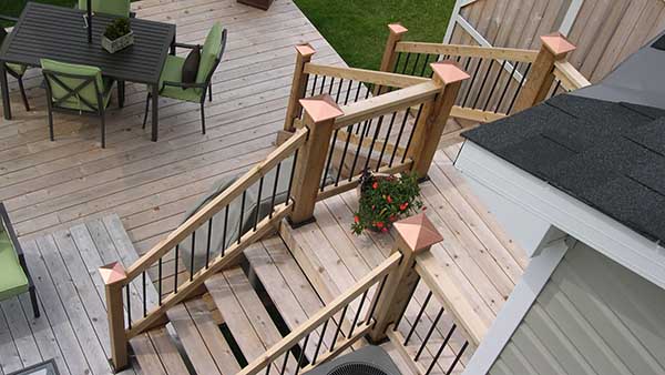 Decking installed perpendicular to house after framing