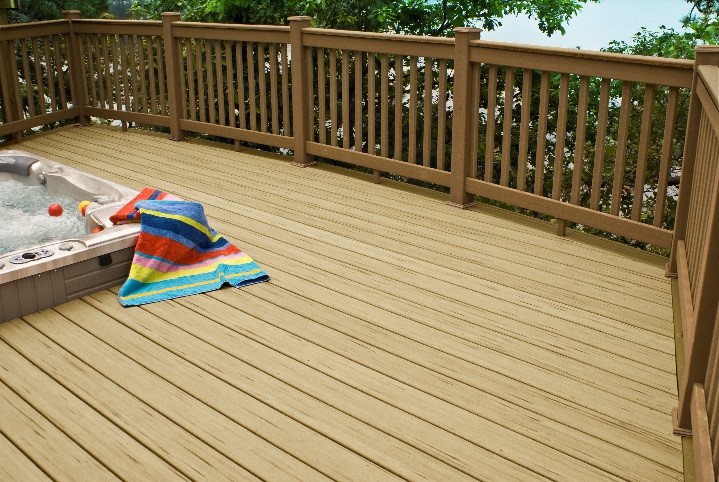 Composite deck and railing around sunken hot tub