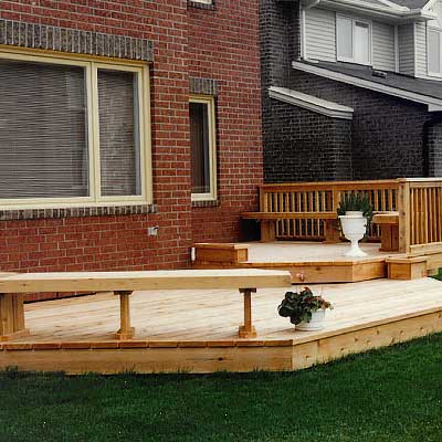 wood deck design project - low-level wrap around cedar deck with benches