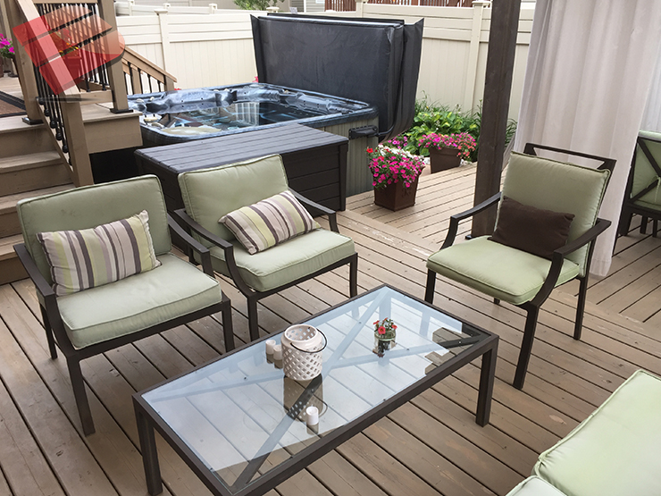 Even soaking wet this multi-level pool deck is glamorous. It features ample seating and sunning areas, a fire-pit, and a flower box.