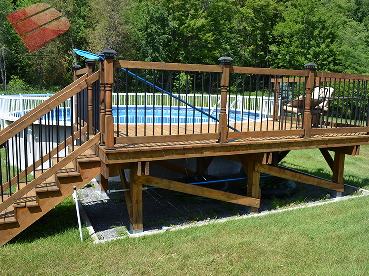 Even soaking wet this multi-level pool deck is glamorous. It features ample seating and sunning areas, a fire-pit, and a flower box.