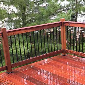 Renovated deck with cedar decking, railing and Snap Lock.