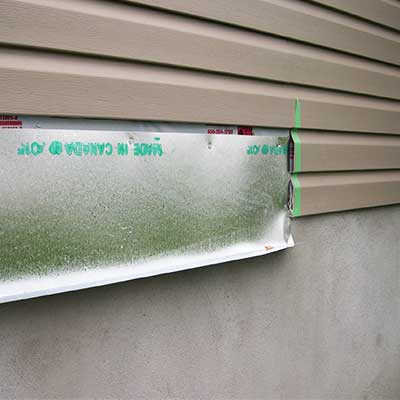 Flashing in behind ledger