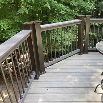 Composite railings with snap lock balusters