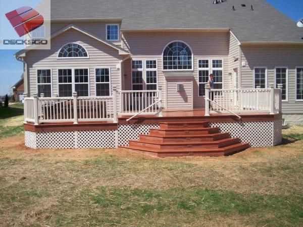 Mid level deck with cascading stairs built by Decks R Us.