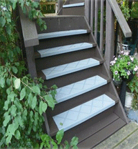 Fiberglass stair tread covers gave this old stair case a new life. Fiberglass stair tread covers gave this old stair case a new life.