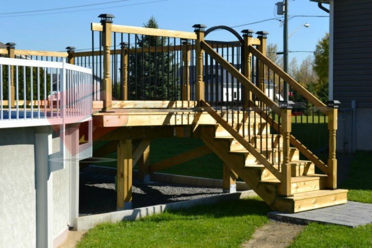 A Perfect Pair: Mid-level Deck and Above Ground Pool Above ground pool deck, treated wood, deck foot anchor